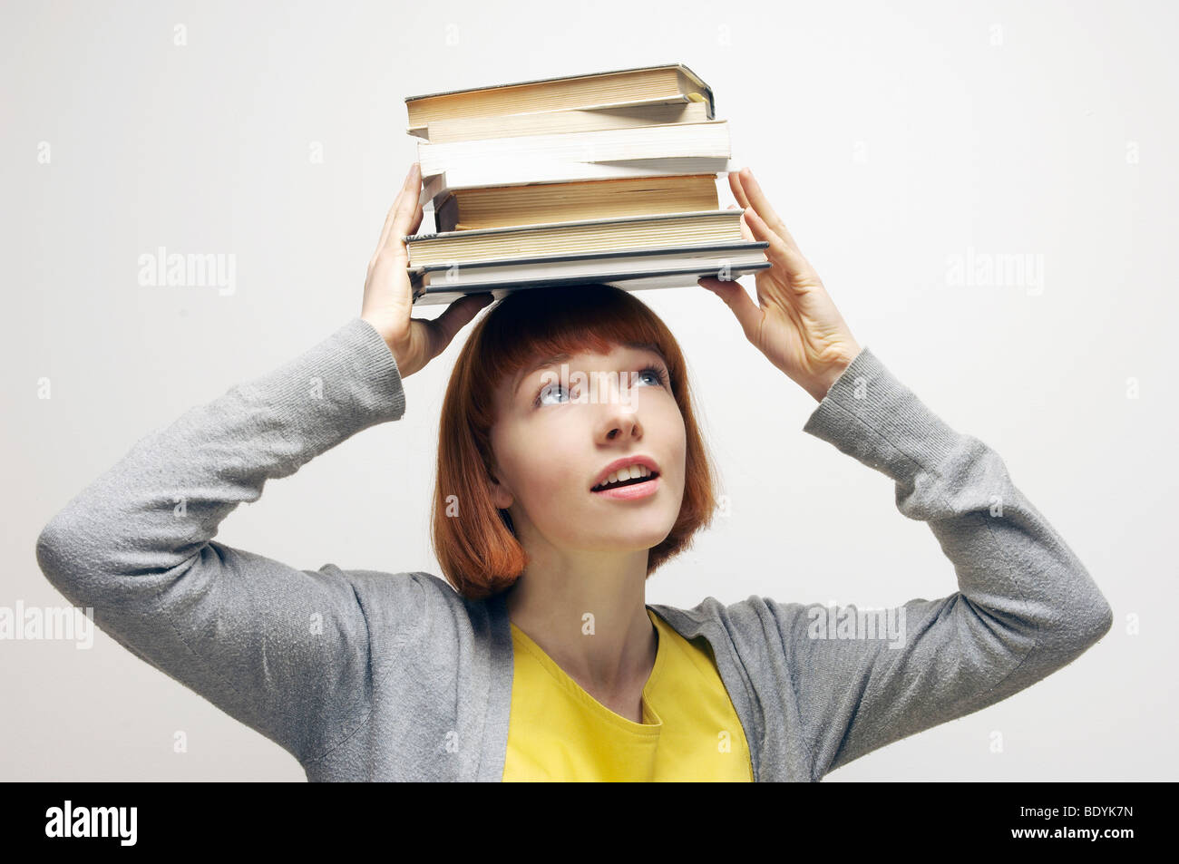 Book on head adult balancing hires stock photography and images Alamy