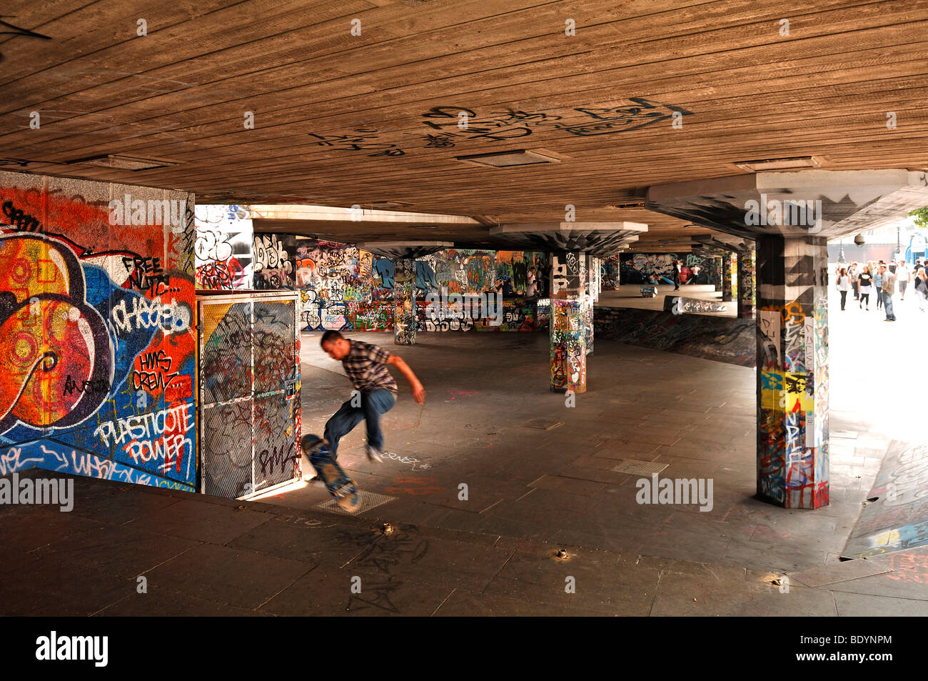Skateboard facility with graffitied walls on the Thames, London