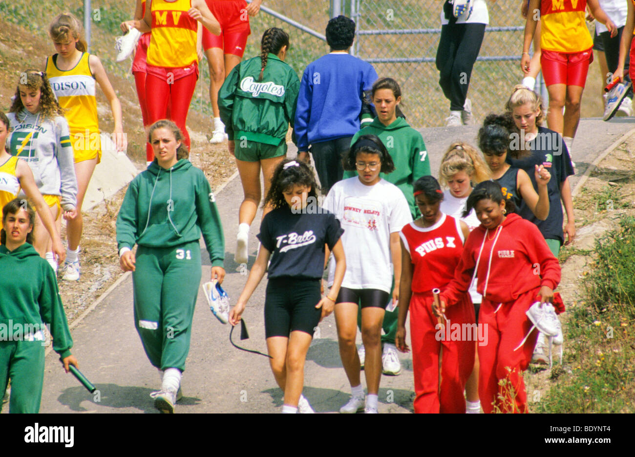 mixed race high school girls prepare to run in track events Stock Photo