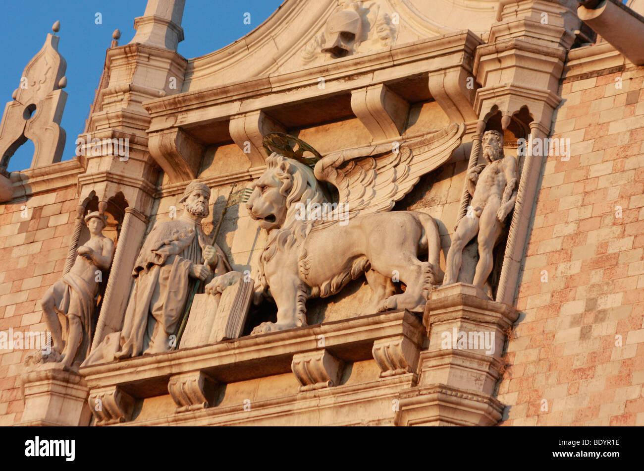The Winged Lion ,seen here on Porta della Carta of the Doge's Palace,is the famous symbol of Venice,Venezia, in Italy,Italia Stock Photo