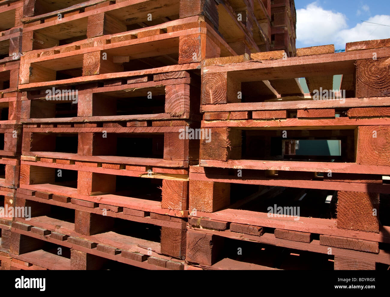 a stack of wooden brown pallets in daylight Stock Photo - Alamy