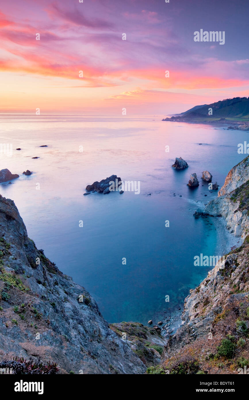 Sunset with offshore rocks. Big Sur coast. California Stock Photo