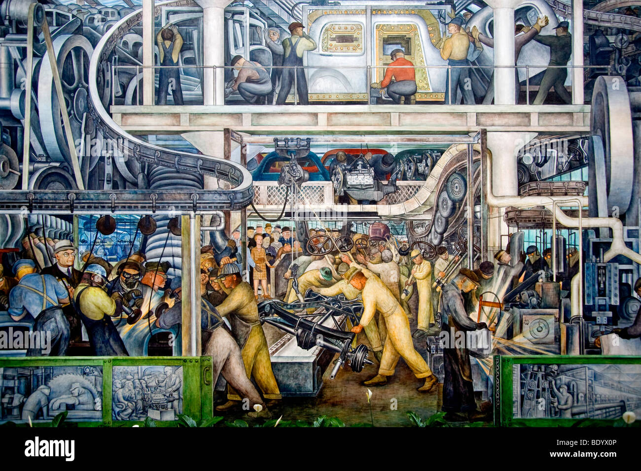 Ford River Rouge factory workmen assemble new cars in a 1933 fresco mural by Diego Rivera at the Detroit Institute of Art Stock Photo