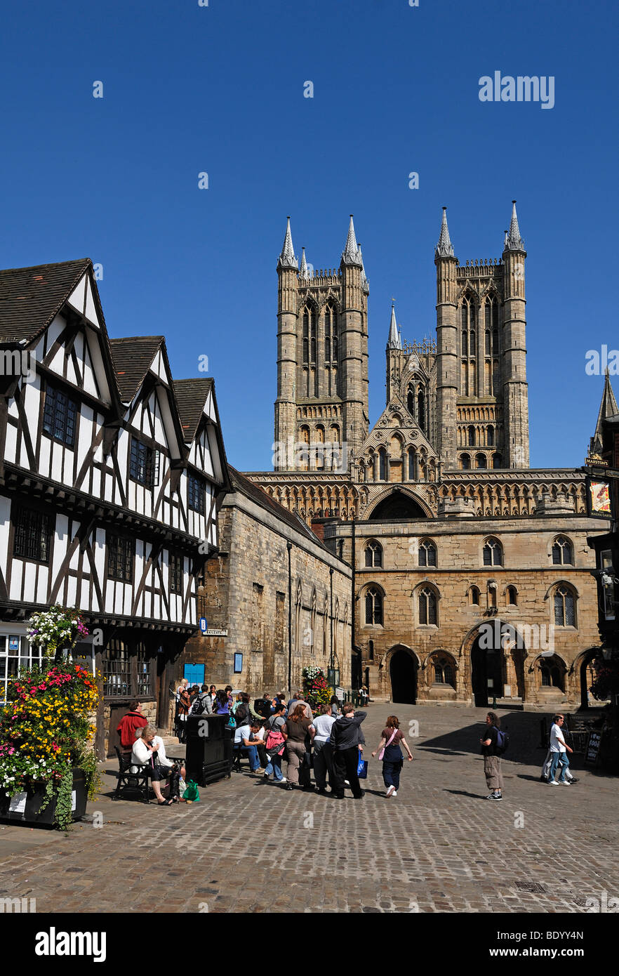 Lincoln Cathedral or St. Mary's Cathedral, 12th and 13th Century, Gothic-Romanesque, front left half-timbered building built in Stock Photo