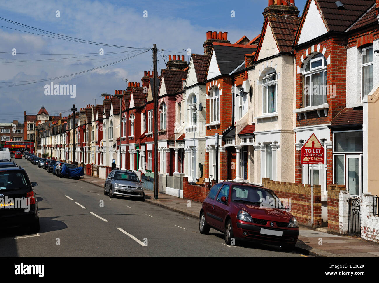 Typical English terraced houses with telephone lines, Undine Street