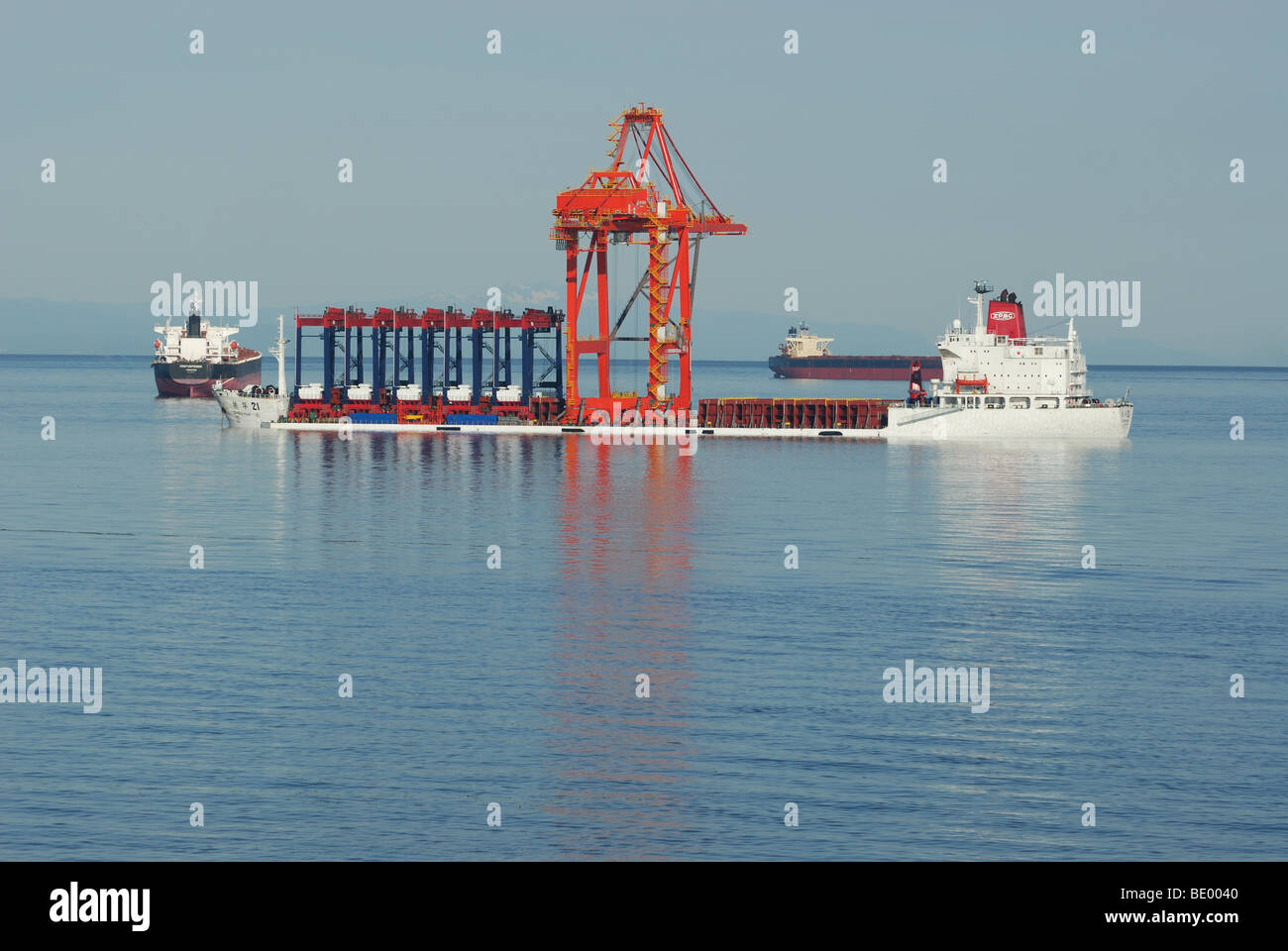 Anchored Freighter carrying the world's largest Gantry Crane. to be