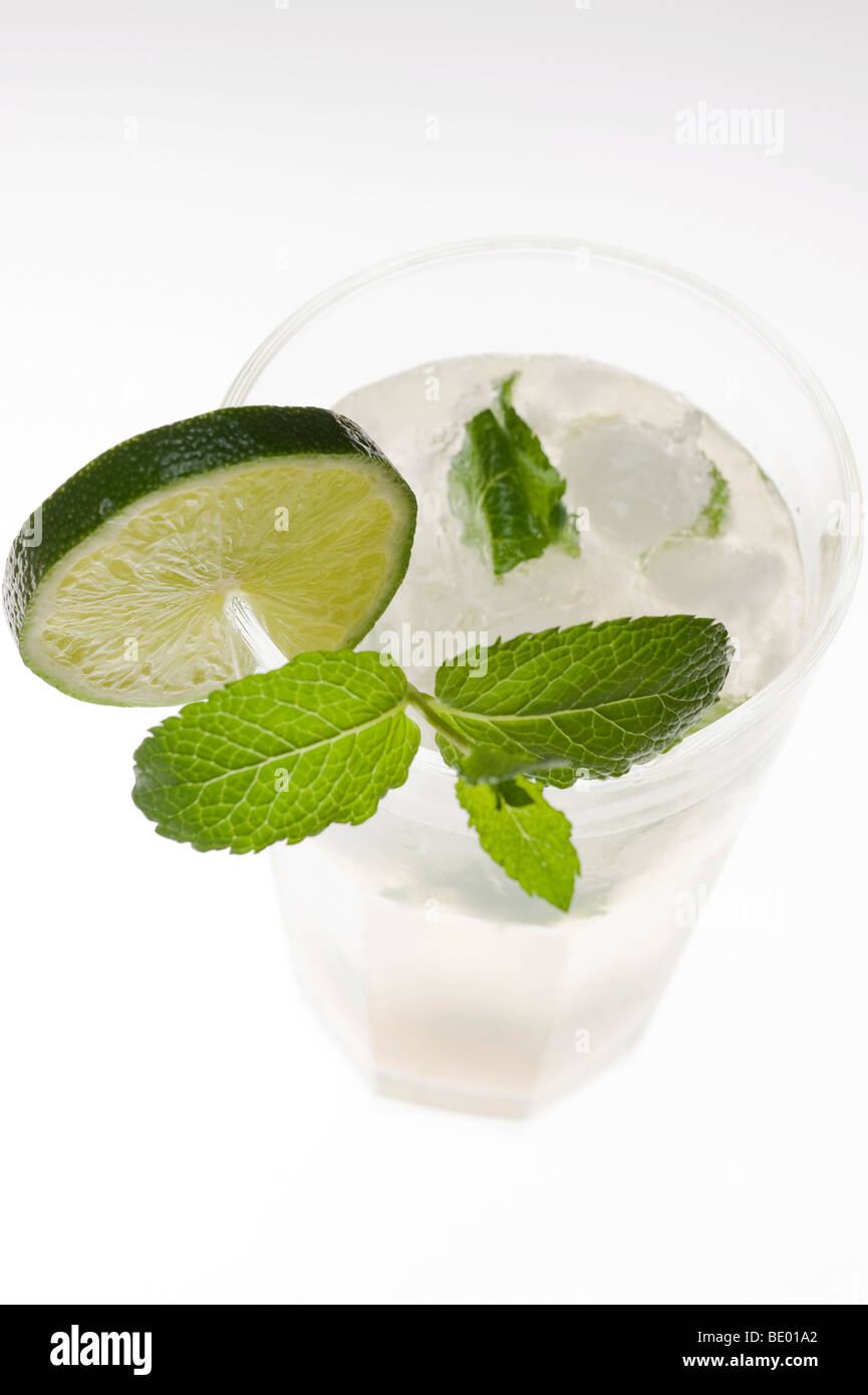 Mojito, mixed drink with brown sugar, rum, mint, lime juice and tonic water Stock Photo
