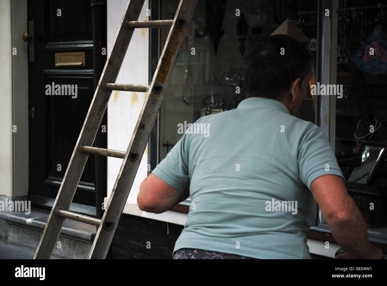 Walking under ladder superstition hires stock photography and images