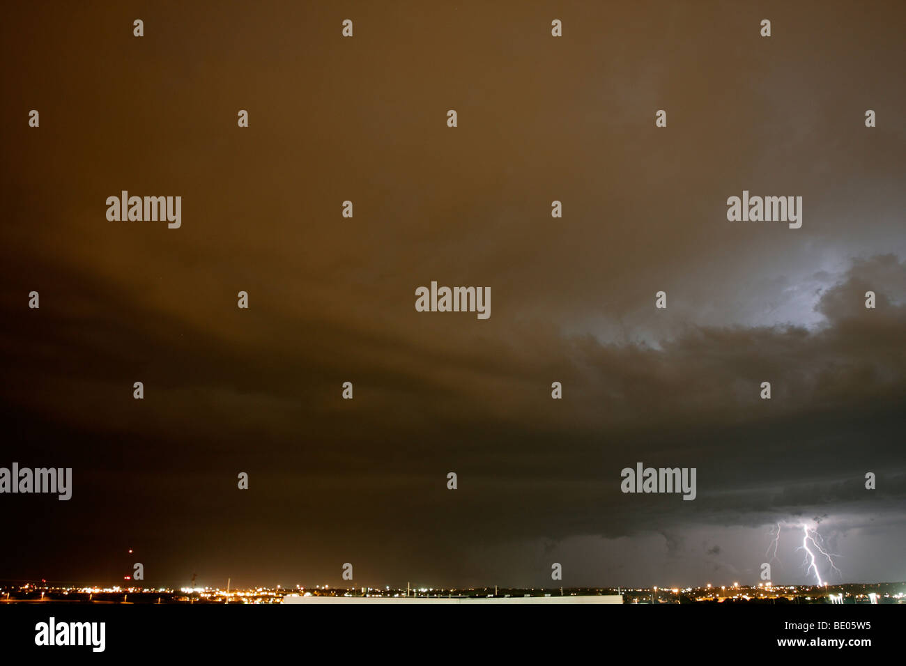 Lightning groundstrike on the Lincoln, Nebraska skyline at night. Stock Photo