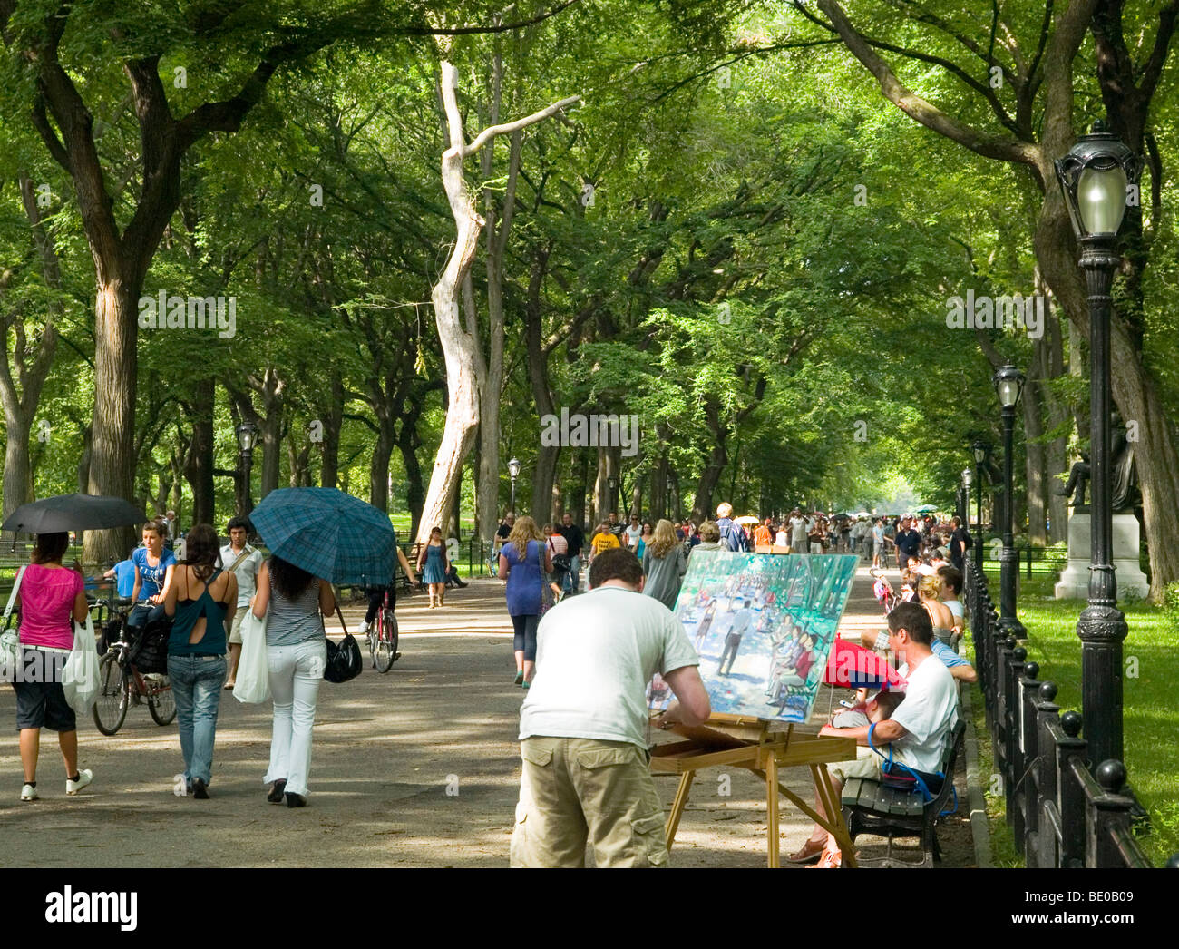A busy summer afternoon on the Mall in Central Park, New York City USA ...