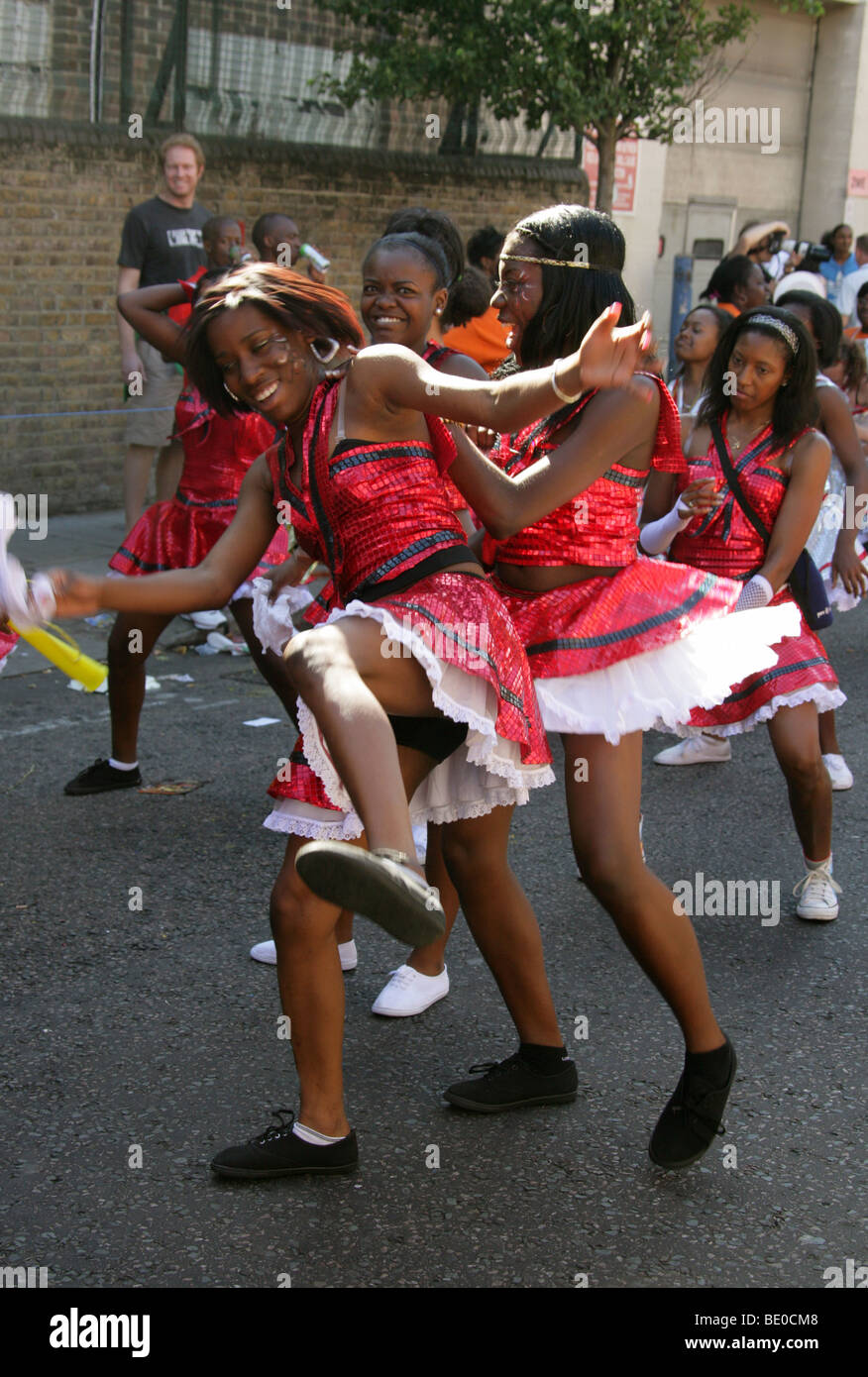Young Caribbean Girls Dancing in the Notting Hill Carnival Parade 2009 Stock Photo