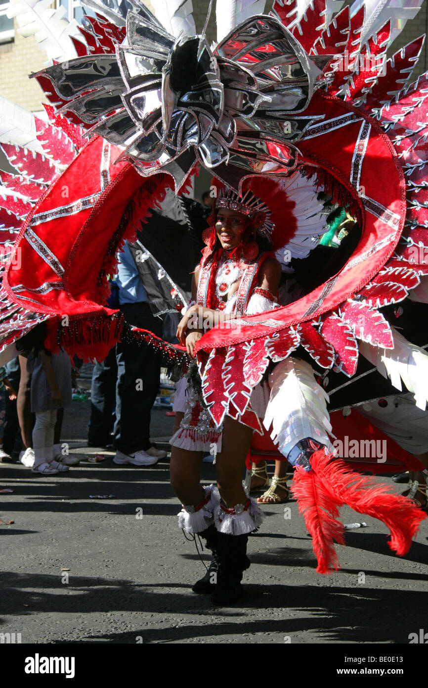 Red Indian Carnival Girl in the Notting Hill Carnival Parade 2009 Stock Photo