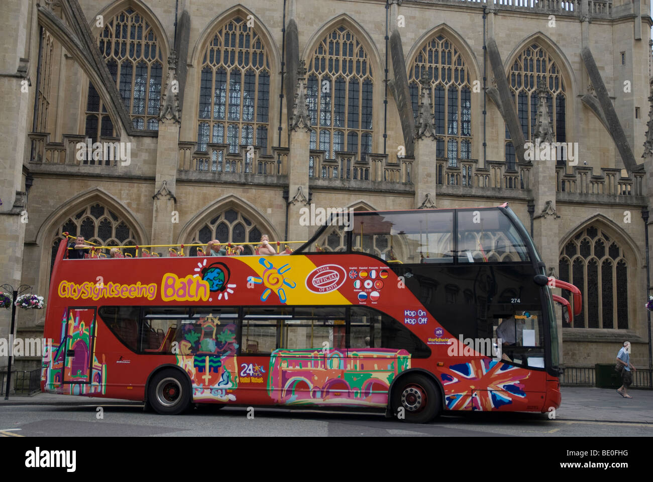 Sightseeing bus of Bath Spa waiting for passengers outside the Abbey