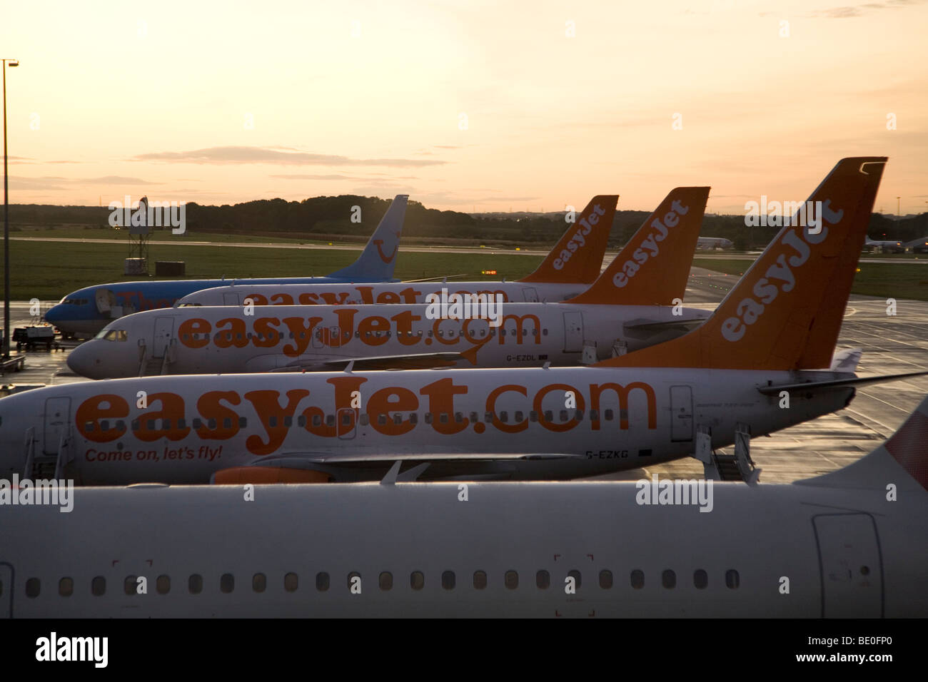 Easyjet airliners stands on the tarmac of Newcastle International Airport in England. Stock Photo