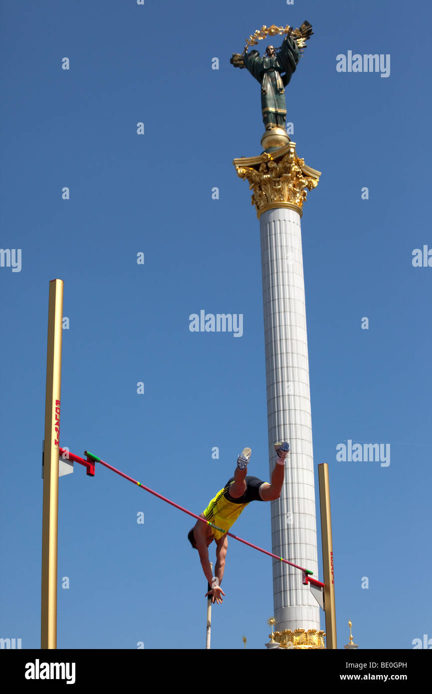 A pole vaulting competition taking place in Independence Square in Kiev