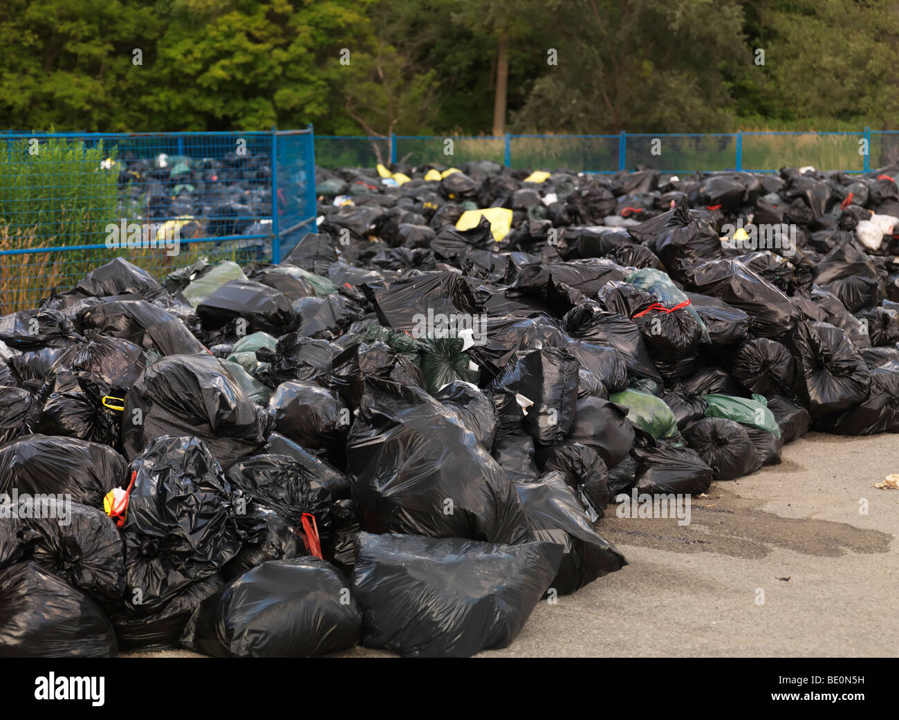 Garbage dump in a park Stock Photo Alamy