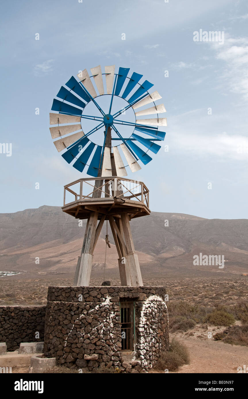 Windmill on a stone well for pumping water, Lanzarote, Canary Islands. Stock Photo