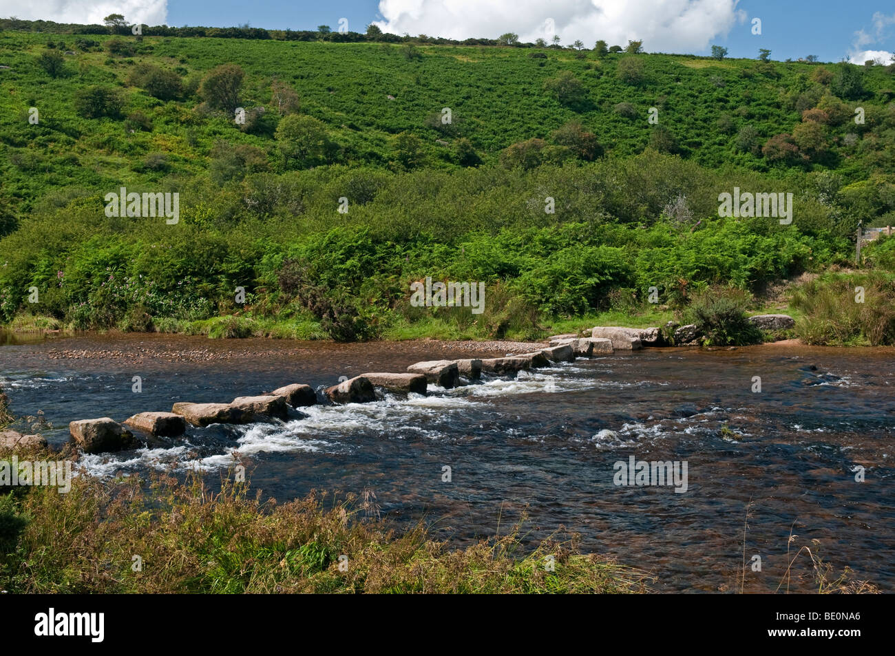 Traditional stone crossing over River, Dartmoor, Devon, England Stock Photo