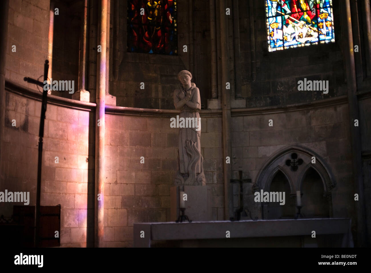 The statue of St Joan of Arc burning at the stake in a chapel at Rouen Cathedral in Rouen, France Stock Photo