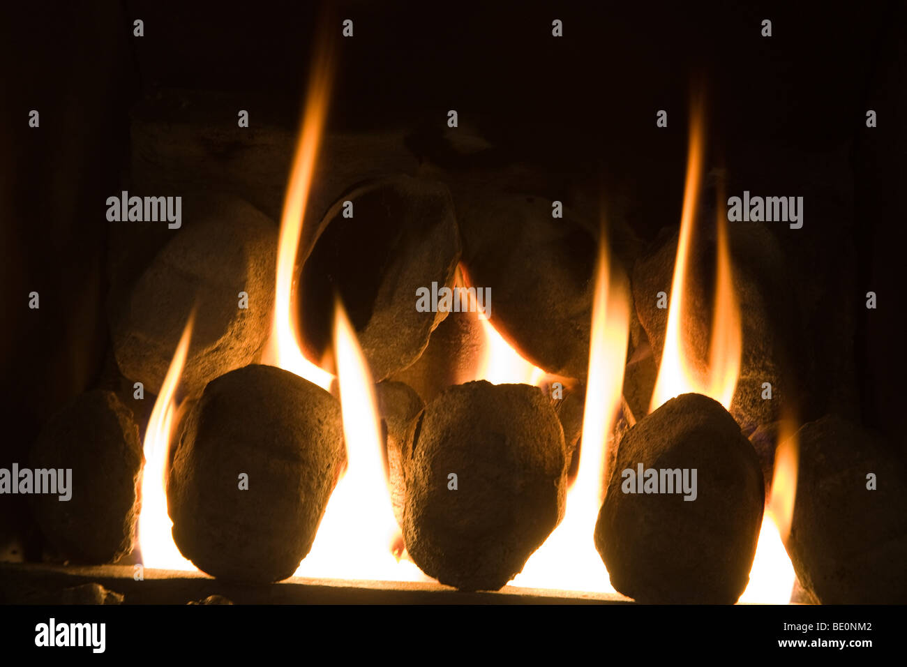 Close Up Calor Gas Fire With Artificial Coals Stock Photo