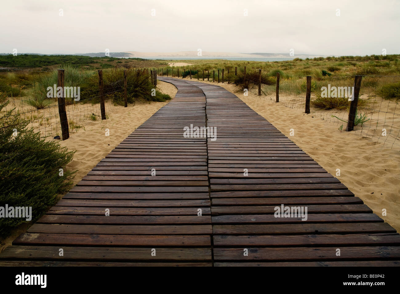 Boardwalk across the sand dunes to the beach at Cap Ferret on the Atlantic south west coast of France out of season Stock Photo