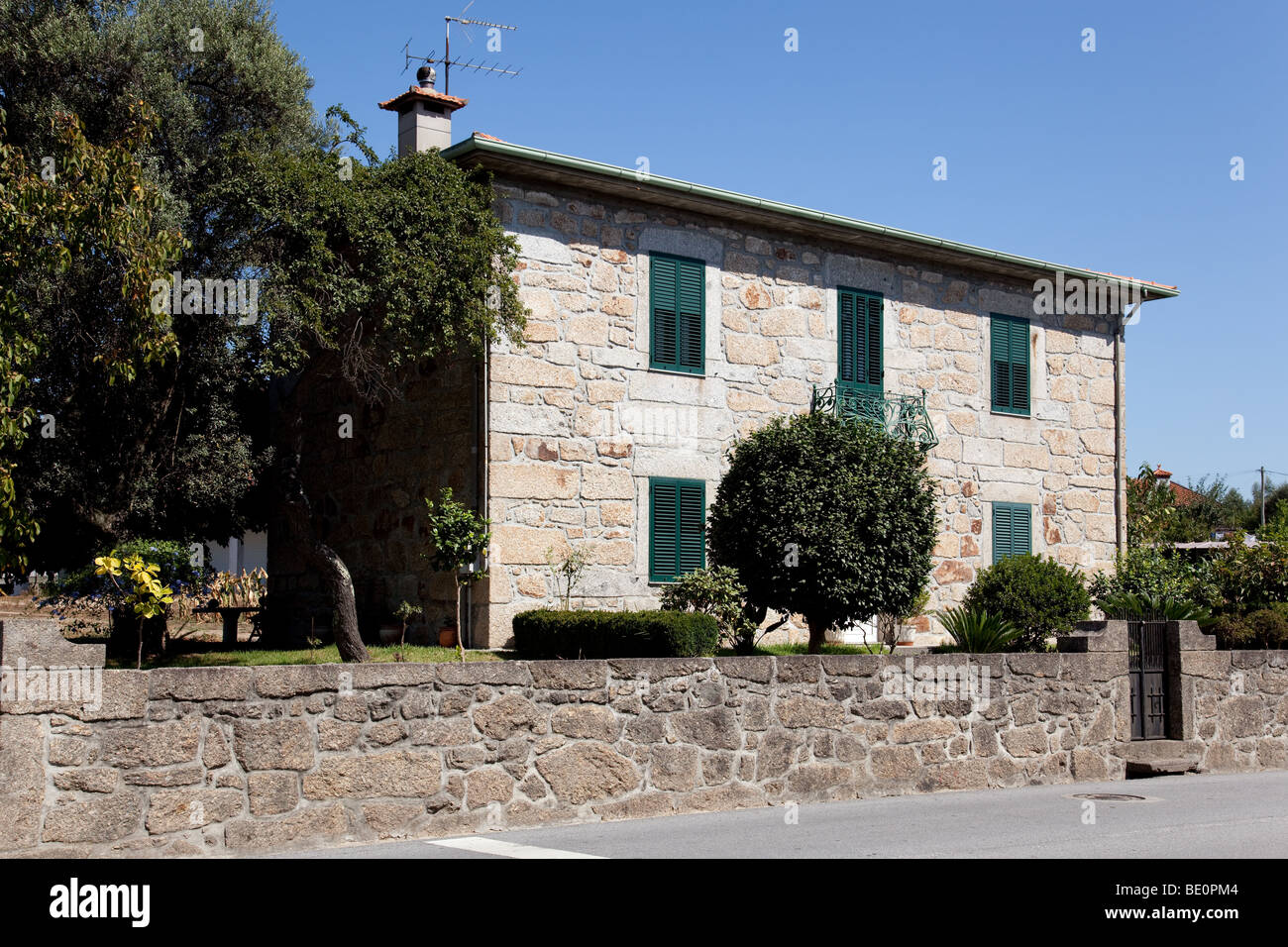 Typical Minho Region House made of granite stone in Vila Nova de Famalicão, Braga District Portugal. Stock Photo