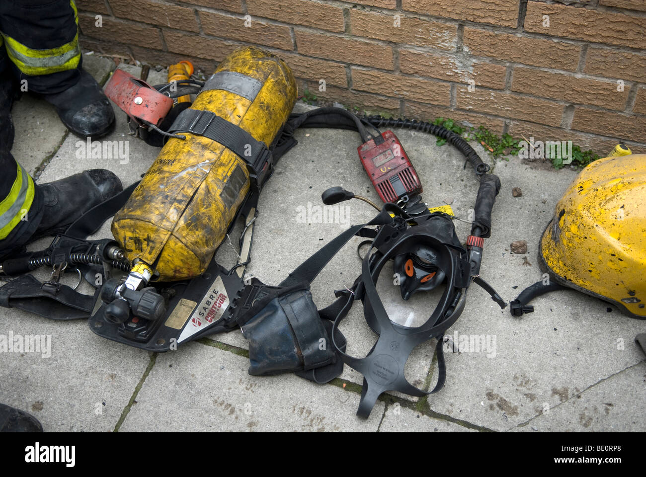 Firefighters breathing apparatus set on ground after coming out of