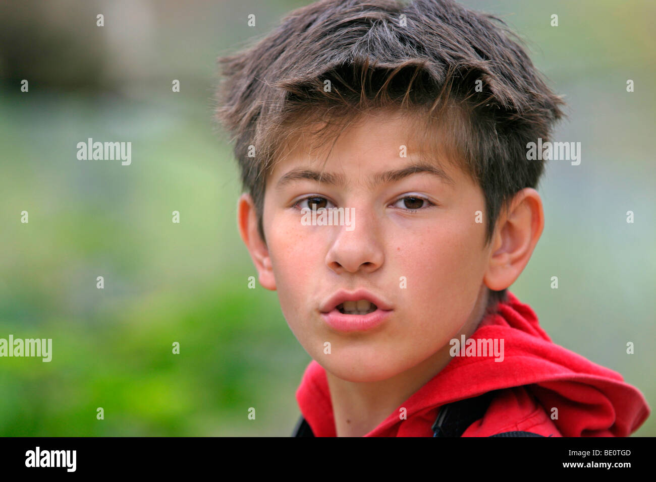 portrait of a dark haired young boy Stock Photo - Alamy