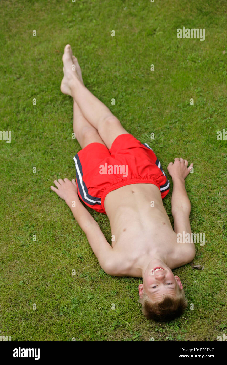 Topless lawn boy — img 10