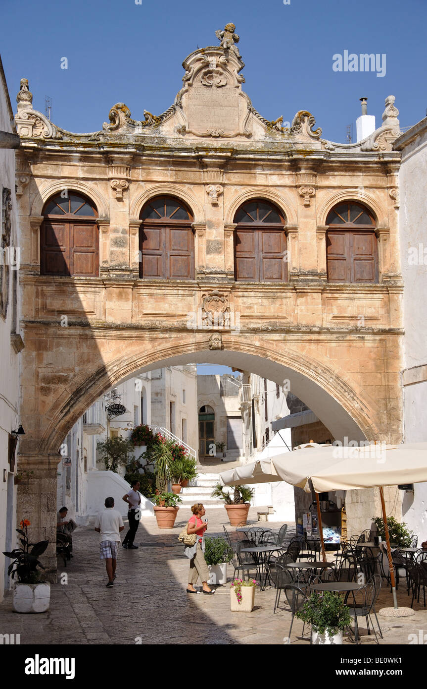 Palazzo Vescovile and archway, Ostuni, Brindisi Province, Puglia Region, Italy Stock Photo