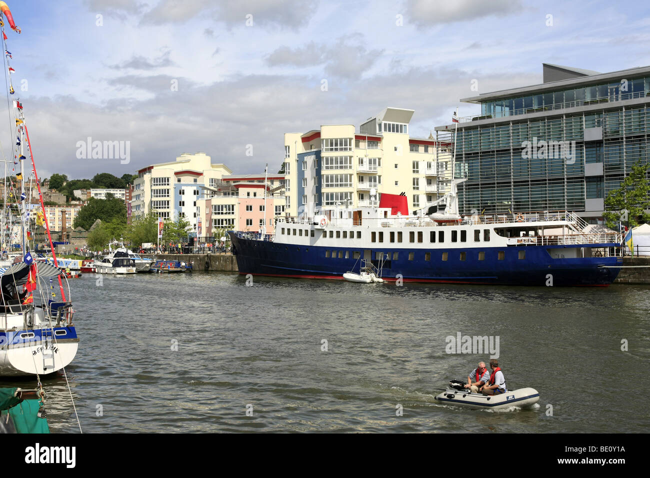 Harbourside Apartments in Bristol City with ships and boats mored up