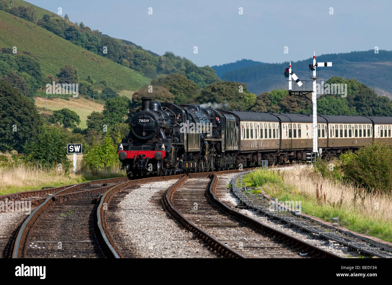 Steam Locomotive 78019 approaches Carrog Station at the end of it's journey from Llangollen on the Llangollen Steam Railway Stock Photo