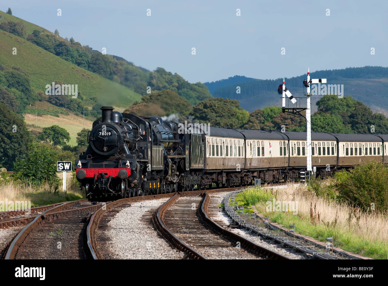 Steam Locomotive 78019 approaches Carrog Station at the end of it's journey from Llangollen on the Llangollen Steam Railway Stock Photo