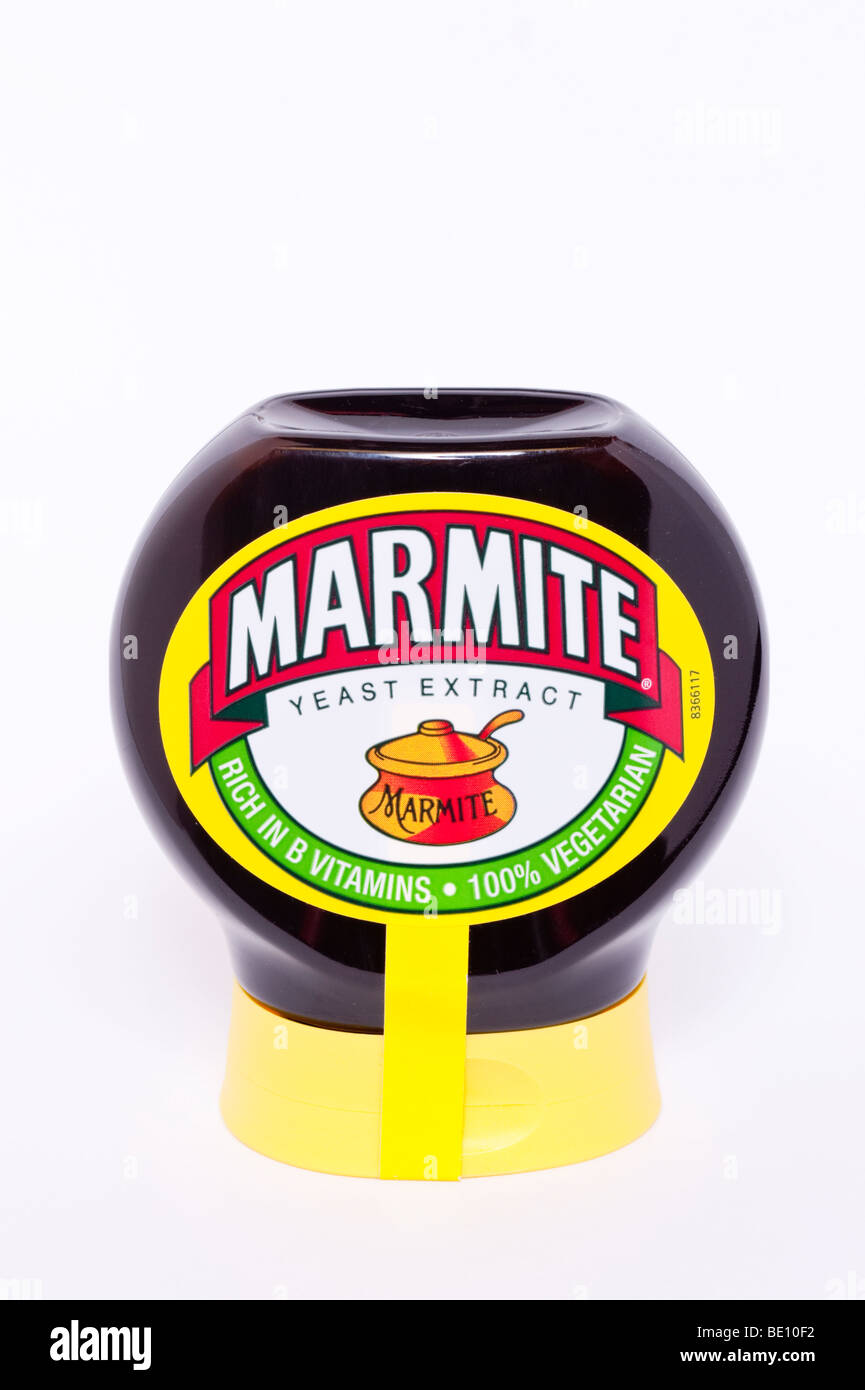 A close up of a plastic jar of squeezable marmite on a white background Stock Photo
