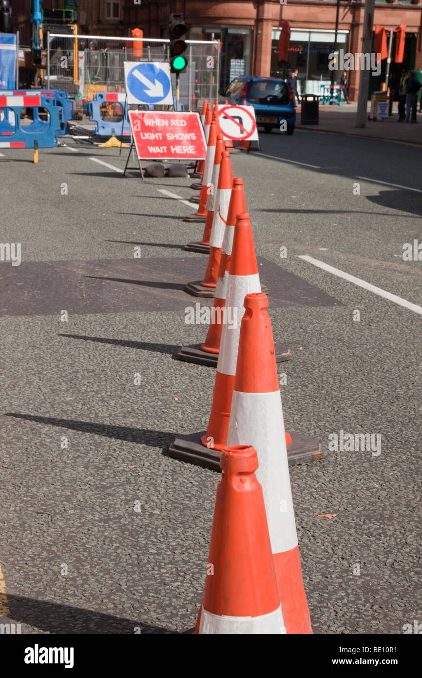 Traffic cones on a city road by roadworks. England UK Britain Europe