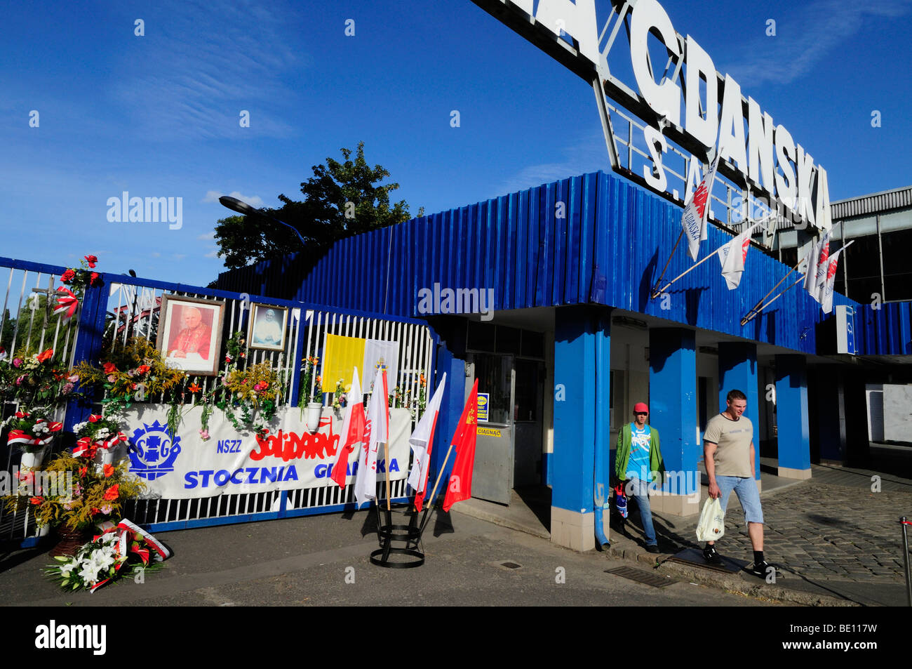 Workers leaving Gdansk shipyard, Poland Stock Photo
