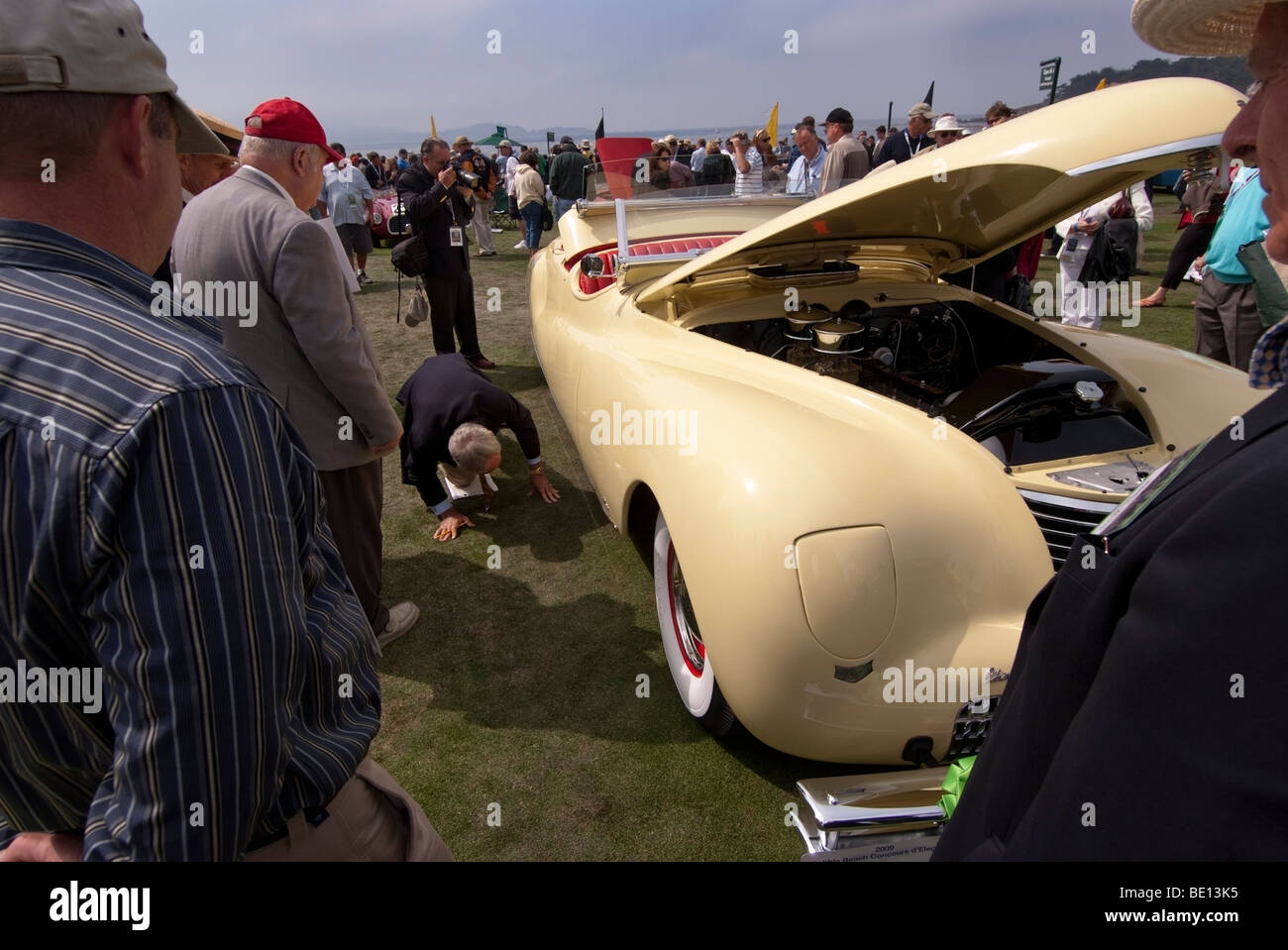 Concours judge inspecting a 1941 Chrysler LeBaron Newport at the 2009 Pebble Beach Concours d'Elegance Stock Photo