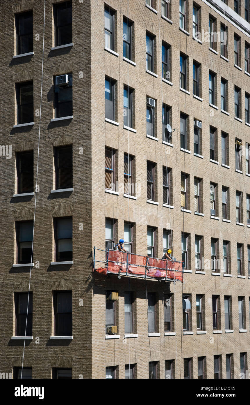 Window washers on a building in New York City Stock Photo Alamy
