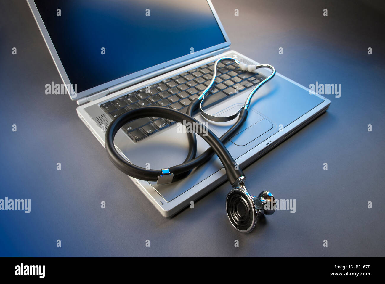 Stethoscope on laptop in blue Stock Photo - Alamy