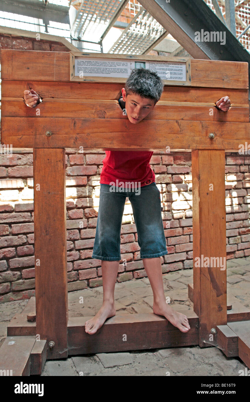 young boy in a pillory Stock Photo: 25842889 - Alamy