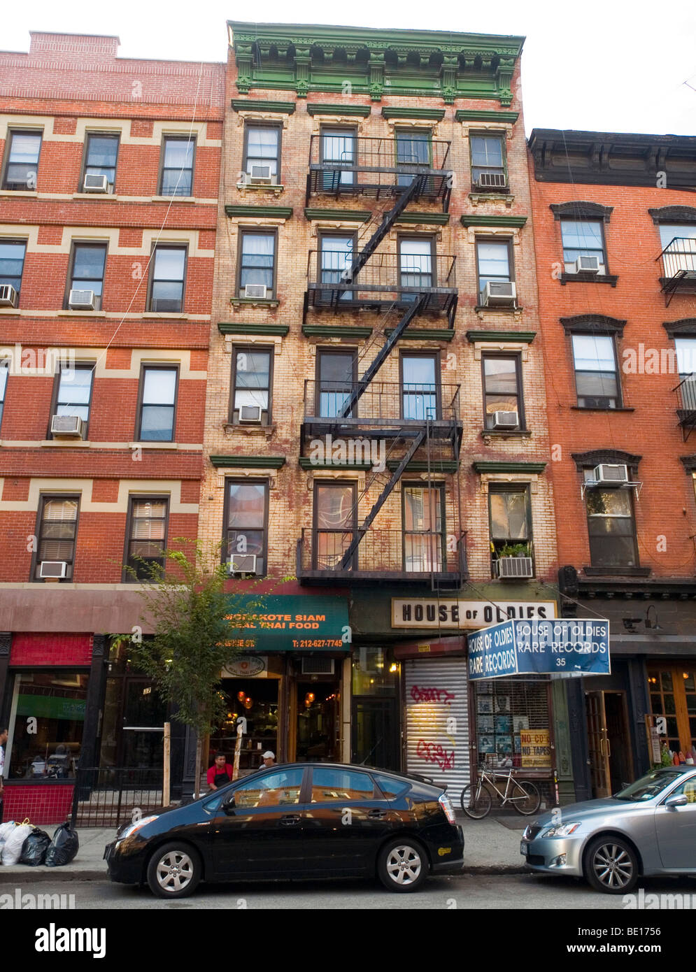 A row of shops and apartment buildings in Greenwich Village, New York City USA Stock Photo