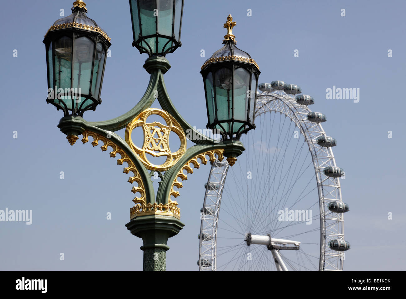 top of a lamp post on westminster bridge with the millennium wheel in the background london uk Stock Photo