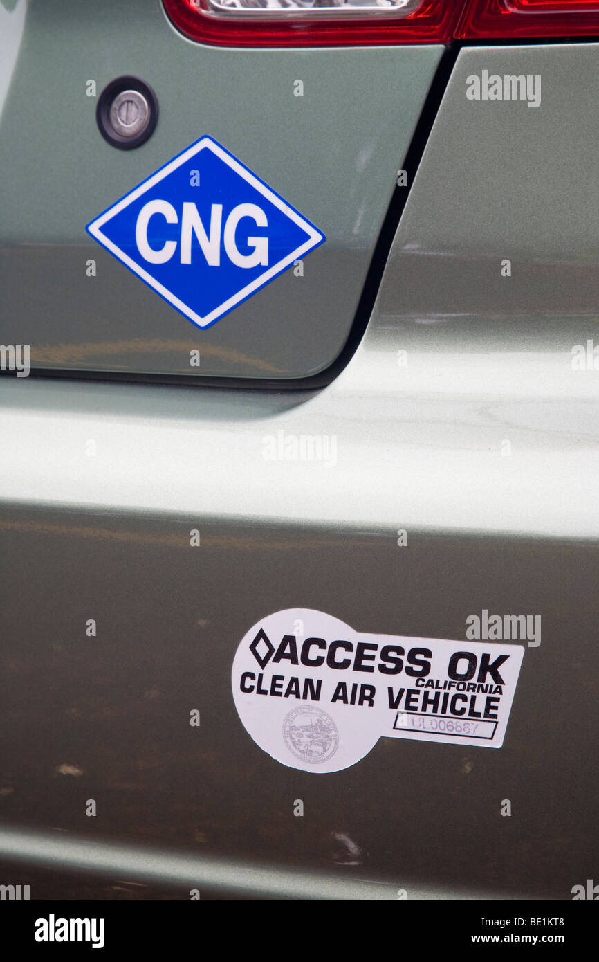 A close up of CNG (compressed natural gas) and Clean Air Vehicle stickers on a Honda Civic natural gas vehicle (NGV). California Stock Photo