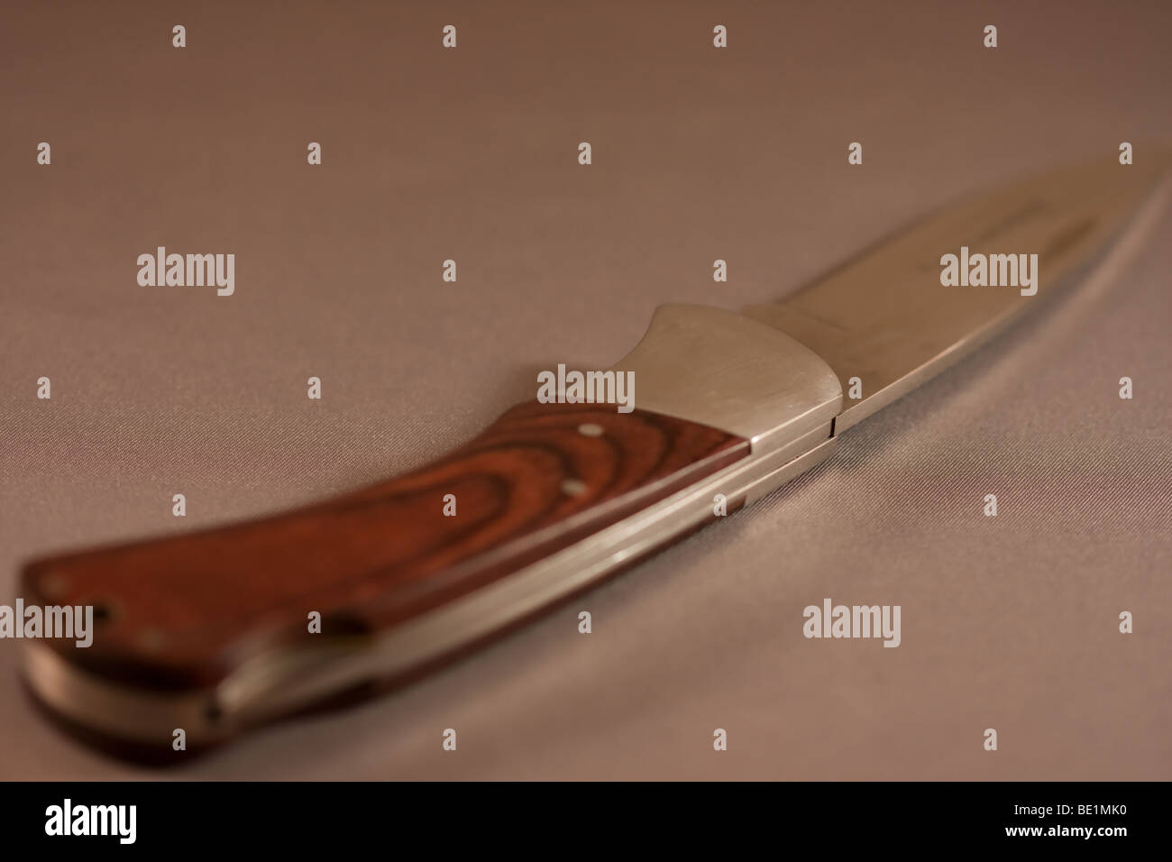 brown and silver long blade hunting knife Stock Photo Alamy