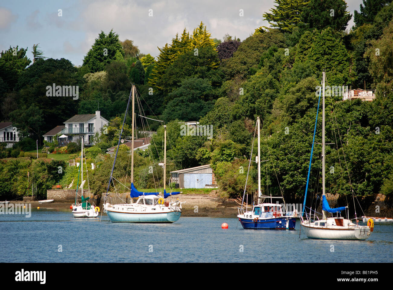 yachts in restronguet creek on the river fal near truro in cornwall, uk Stock Photo