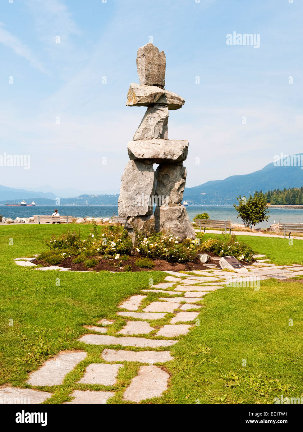 Inukshuk, traditional Inuit landmark and navigation aid, near English Bay, Vancouver, Canada.  Constructed by Alvin Kanak, 1986. Stock Photo