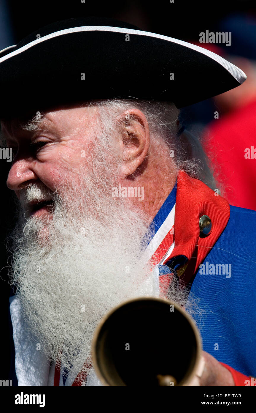 Man dressed in colonial costume as Town Crier leading Fourth of July parade in Bristol Rhode Island Stock Photo