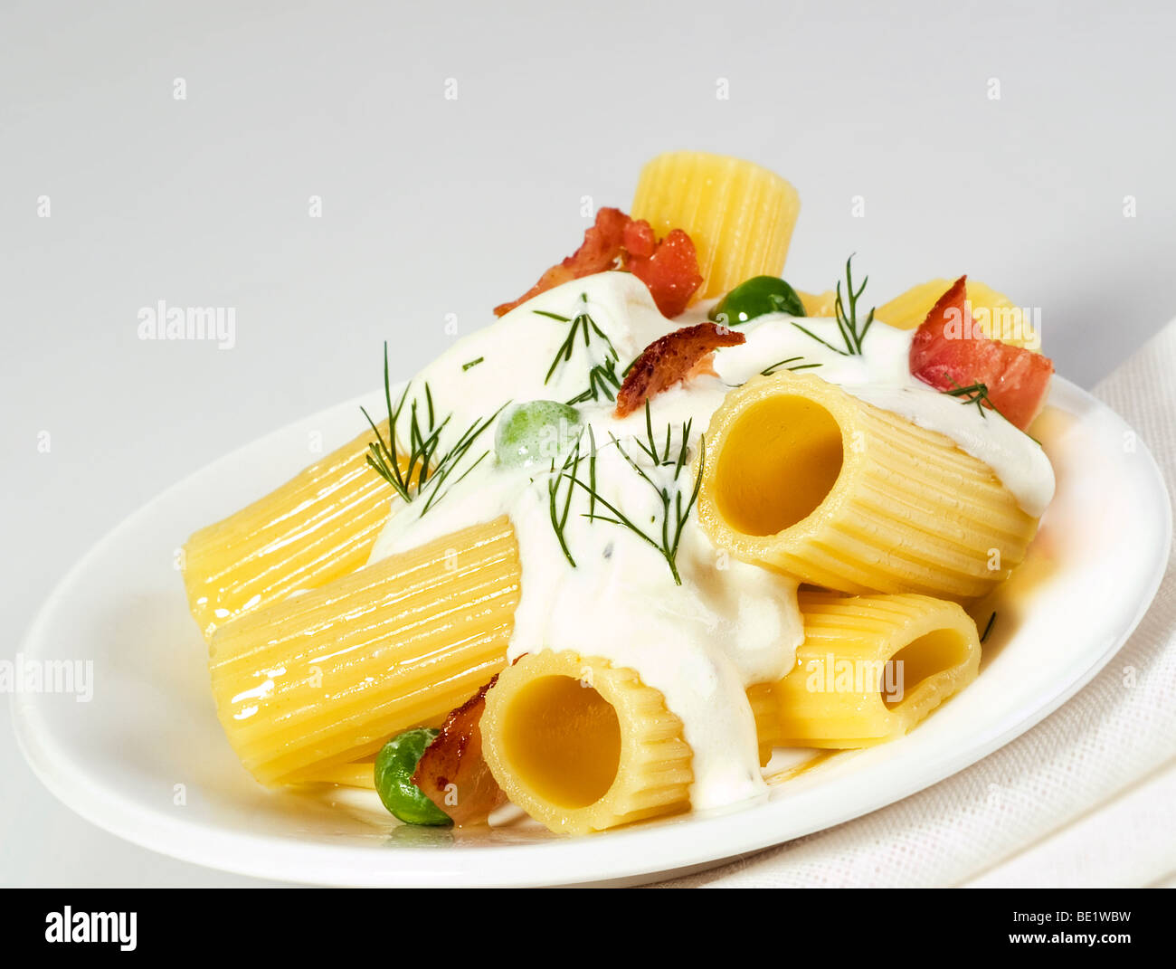 Rigatoni with cream sauce Stock Photo