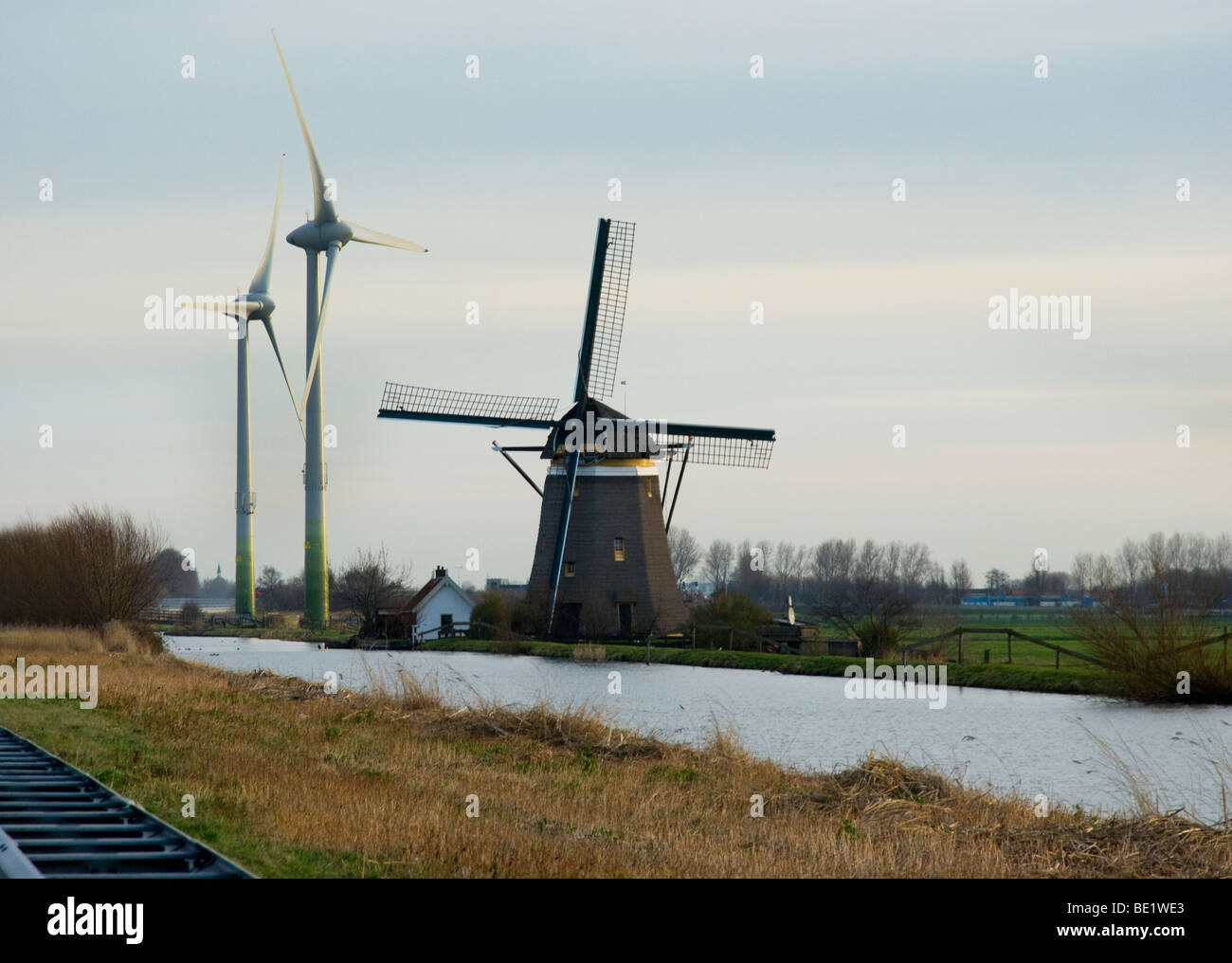 Windmills at Stompwijk, Zuidholland, Netherlands, where old (1748) en new (2006) meet. Stock Photo