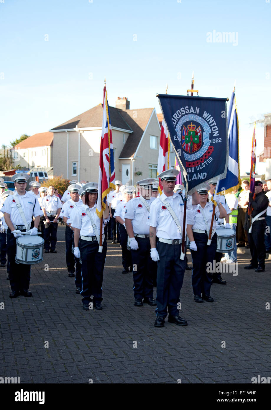 Ardrossan Winton Flute Band (Loyalist/Protestant) stand at the end of their parade in Kilwinning, North Ayrshire, Scotland, UK. Stock Photo